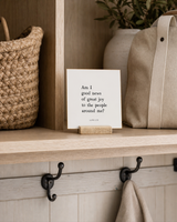 Am I Good News of Great Joy 4x4 Christian shelf sitter with natural wood base, styled in a modern farmhouse mudroom shelf scene.