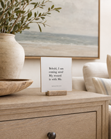 Behold, I Am Coming Soon 4x4 Christian shelf sitter with natural wood base, styled in a coastal living room console scene.