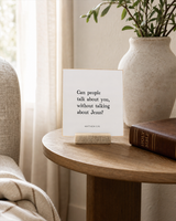 Can People Talk About You Without Talking About Jesus 4x4 Christian shelf sitter with natural wood base, styled in a prayer corner side table scene.