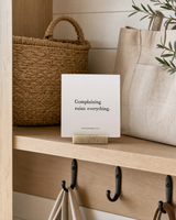 Complaining Ruins Everything 4x4 Christian shelf sitter with natural wood base, styled in a modern farmhouse mudroom shelf scene.