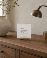 Do Not Let the World Teach You Who God Is 4x4 Christian shelf sitter with natural wood base, styled in a quiet home office credenza scene.