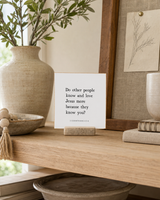 Do Other People Know and Love Jesus More 4x4 Christian shelf sitter with natural wood base, styled in a creative studio shelf scene.