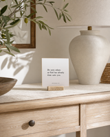Do Unto Others 4x4 Christian shelf sitter with natural wood base, styled in a sunlit white oak entry console scene.