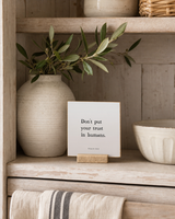 Don't Put Your Trust in Humans 4x4 Christian shelf sitter with natural wood base, styled in a farmhouse hutch scene.