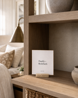 Family Redefined 4x4 Christian shelf sitter with natural wood base, styled in a bedroom bookcase scene.