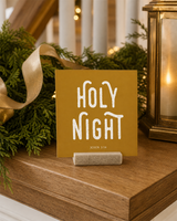 Gold 4x4 Holy Night Christmas Shelf Sitter in a elegant stair landing with its rustic wood slot stand.