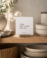 I Hope There's No Hell 4x4 Christian shelf sitter with natural wood base, styled in a cottage kitchen open shelf scene.
