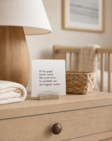 If the Gospel Doesn't Sound Like Good News 4x4 Christian shelf sitter with natural wood base, styled in a neutral nursery dresser scene.