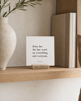 Jesus Has the Last Word 4x4 Christian shelf sitter with natural wood base, styled in a organic modern built-in shelf scene.