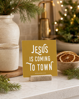 Gold 4x4 Jesus Is Coming to Town Christmas Shelf Sitter in a christmas kitchen coffee station with its rustic wood slot stand.