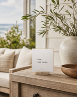 Love Your Enemy 4x4 Christian shelf sitter with natural wood base, styled in a covered porch console scene.