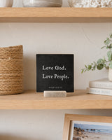 Love God Love People 4x4 Christian Shelf Sitter on a light shelf beneath a wood mantel with a woven basket and eucalyptus.