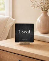 Loved 4x4 Christian Shelf Sitter on a light dresser with a blush ceramic vase, pale book, and airy neutral bedding.
