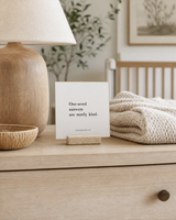 One-Word Answers Are Rarely Kind 4x4 Christian shelf sitter with natural wood base, styled in a neutral nursery dresser scene.
