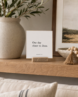 One Day Closer to Jesus 4x4 Christian shelf sitter with natural wood base, styled in a family room floating shelf scene.