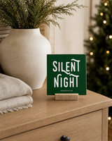 Dark Green 4x4 Silent Night Christmas Shelf Sitter in a winter bedroom dresser with its rustic wood slot stand.