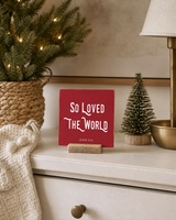 Red 4x4 So Loved the World Christmas Shelf Sitter in a christmas nursery dresser with its rustic wood slot stand.