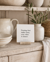 Trusting God Makes Sense 4x4 Christian shelf sitter with natural wood base, styled in a farmhouse hutch scene.