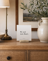 We Need More Boaz's 4x4 Christian shelf sitter with natural wood base, styled in a dining room buffet scene.