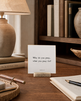 Why Do You Pray What You Pray For 4x4 Christian shelf sitter with natural wood base, styled in a library writing desk scene.