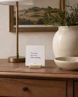 You Don't Get Away With Anything 4x4 Christian shelf sitter with natural wood base, styled in a dining room buffet scene.